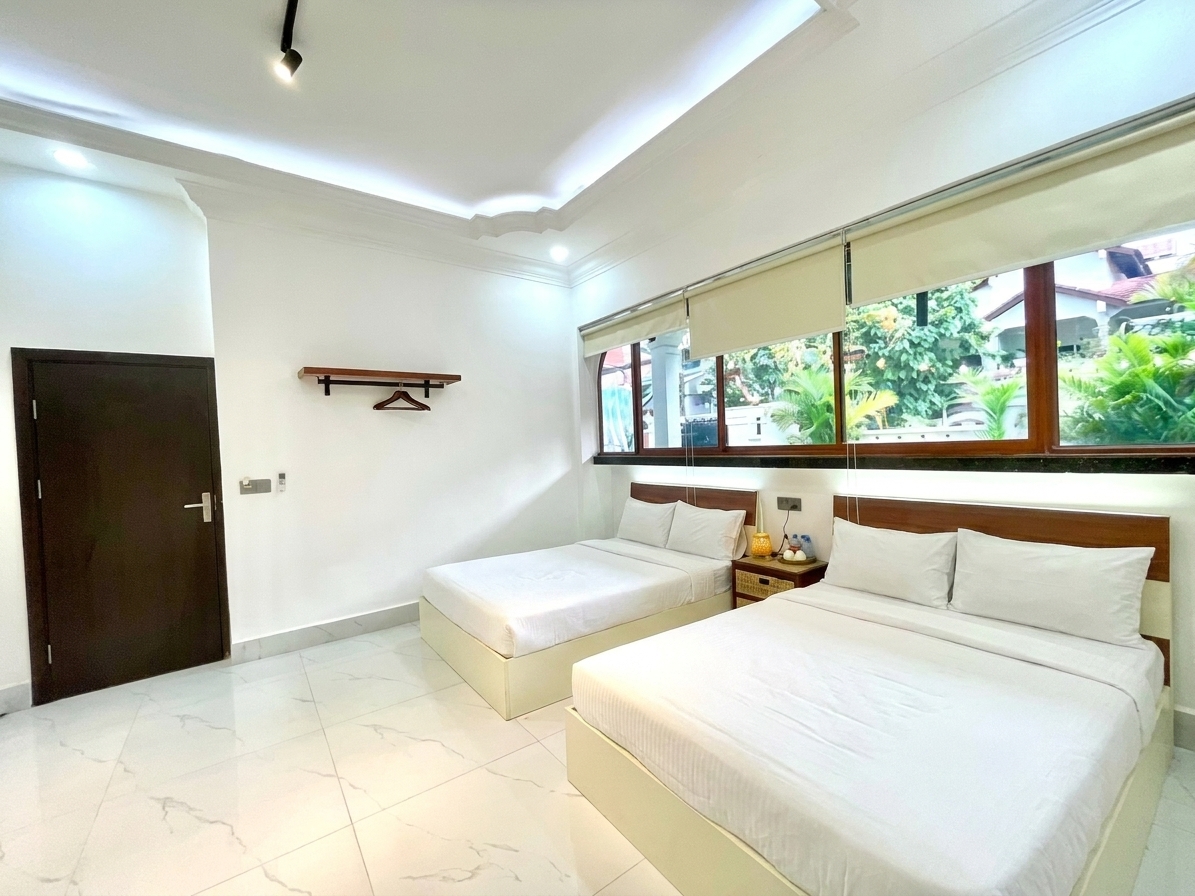 Deluxe Quad room with Bathtub